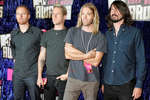 Foo Fighters: Нейт Мендель, Крис Шифлетт, Тейлор Хокинс и Дейв Грол на церемнии вручения премии MTV Video Music Awards 2007 в Лас-Вегасе