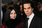 Ник Кейв с супругой на церемонии вручения кинопремий BAFTA в Лондоне
