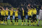 Футболисты дортмундской «Боруссии» празднуют победу над «Олимпиакосом»
