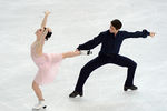 Тесса Вирту и Скотт Мойр (Канада) выступают в произвольной программе танцев на льду, XXII зимние Олимпийские игры в Сочи