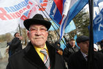 Участник митинга, посвященного годовщине воссоединения Крыма с Россией