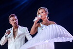 Певцы Дима Билан и Полина Гагарина во время международного музыкального конкурса «Интервидение-2025» в Москве