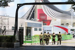 Военные патрулируют олимпийские объекты, Токио, 20 июля 2021 года
