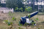 Фрагмент частного самолета Embraer Legacy, потерпевшего крушение в селе Куженкино Бологовского района Тверской области, 24 августа 2023 года