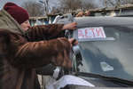 Refugees from Mariupol prepare to leave the city, March 2022