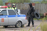 Сотрудники полиции в селе Куженкино Бологовского района Тверской области, 24 августа 2023 года