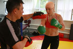 Чемпионка мира по профессиональному боксу Наталья Рагозина и бывший абсолютный чемпион мира по боксу Константином Цзю во время совместной тренировки, 2009 год
