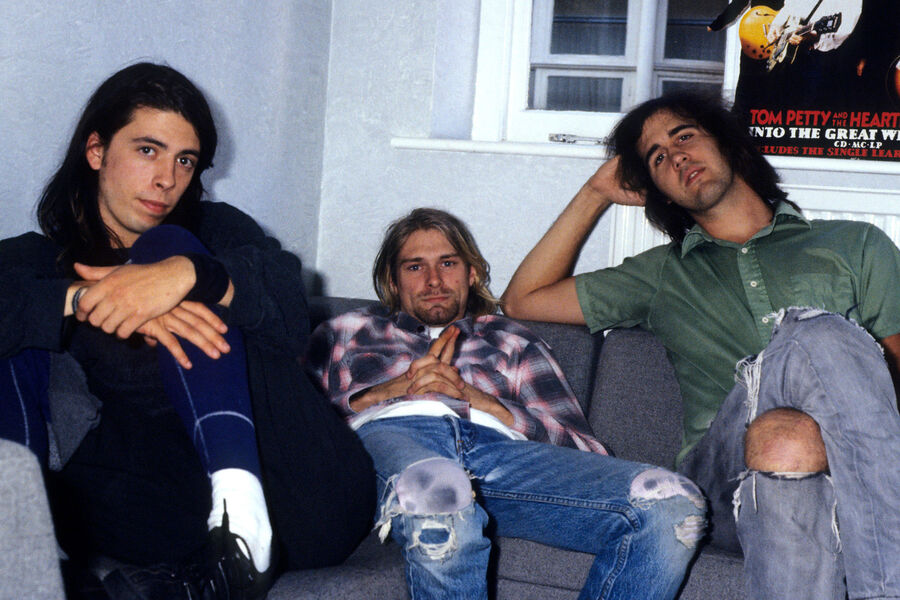 Дэйв Грол, Курт Кобейн, Крист Новоселич во время интервью группы Nirvana в&nbsp;Лондоне, 1991&nbsp;год