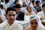Массовая свадьба в День святого Валентина в городе Мандалуйонг, Филлипины, 14 февраля 2023 года
