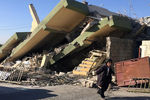 Поврежденное здание в иракском городе Дарбандихан после землетрясения, 13 ноября 2017 года