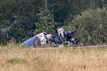 Фрагмент самолета Embraer у поселка Куженкино в Тверской области, 24 августа 2023 года