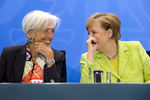 Глава Европейского центрального банка Кристин Лагард и канцлер Германии Ангела Меркель 