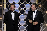 Никола Джулиано и Паоло Соррентино с наградой за «Великую красоту», победившую в номинации «Лучший иностранный фильм»