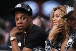 Jay-Z со своей женой Бейонсе