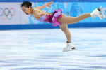 Мао Асада (Япония) выступает в командном турнире на соревнованиях по фигурному катанию, XXII зимние Олимпийские игры в Сочи
