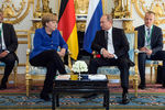 Меркель и Путин на встрече «нормандской четверки»