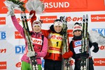 Пьедестал в женской гонке преследования: Тура Бергер, Дарья Домрачева и Андреа Хенкель