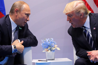 Владимир Путин и Дональд Трамп во время встречи на саммите G20 в Гамбурге