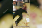 Тело мужчины, устроившего стрельбу в школе № 88 в Ижевске, 26 сентября 2022 года 