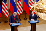 Президент США Дональд Трамп и президент России Владимир Путин во время пресс-конференции по итогам встречи в Хельсинки, 16 июля 2018 года