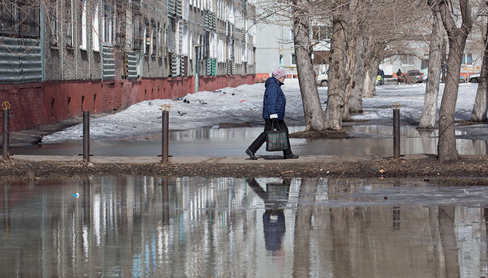 Жительница города на одной из улиц