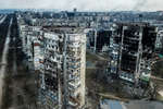 Destroyed houses at the intersection of Shevchenko Boulevard and Kuprina Street in Mariupol, March 2022