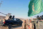 Ополченцы коалиции Сил народной мобилизации (PMF) и иракские военнослужащие в Киркуке, 16 октября 2017 года