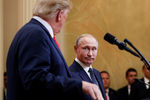 Президент США Дональд Трамп и президент России Владимир Путин во время пресс-конференции по итогам встречи в Хельсинки, 16 июля 2018 года