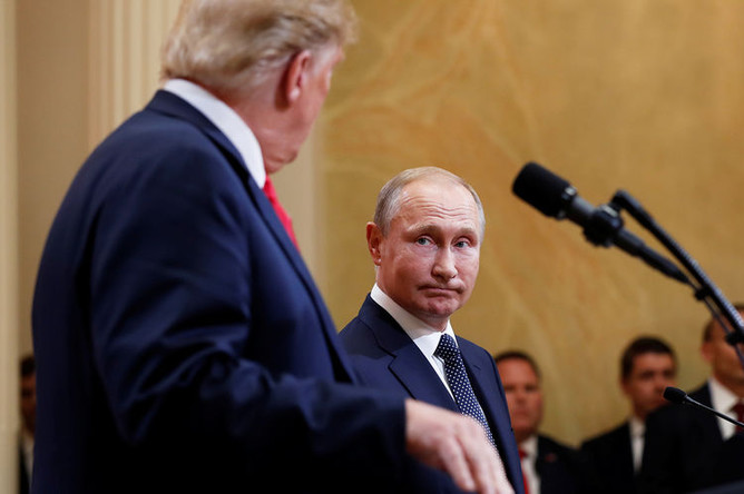 Президент США Дональд Трамп и президент России Владимир Путин во время пресс-конференции по итогам встречи в Хельсинки, 16 июля 2018 года