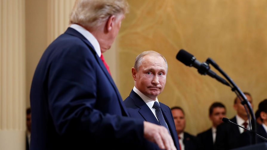 Президент США Дональд Трамп и президент России Владимир Путин во время пресс-конференции по итогам встречи в Хельсинки, 16 июля 2018 года