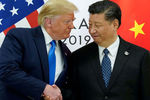Президент США Дональд Трамп и председатель Китайской Народной Республики (КНР) Си Цзиньпин во время встречи на полях саммита G20, 29 июня 2019 года