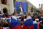 Президент УЕФА Мишель Платини на уличном экране в Санкт-Петербурге во время объявления о том, что в городе пройдут матчи Чемпионата Европы по футболу 2020, 2014 год