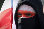 Участник марша «За свободу политзаключенных» в Минске, 4 октября 2020 года