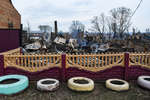 Последствия природного пожара, перекинувшегося на город Уяр в Красноярском крае, 8 мая 2022 года