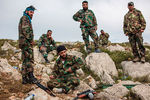 Военнослужащие правительственной армии Сирии на позиции возле города Кесаб, 2014 год
