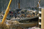 Разбор завалов на месте обрушения крыши «Трансвааль-парка» в московском Ясенево, 14 февраля 2004 года