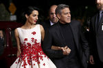 Джордж Клуни с женой Амаль Аламуддин на мировой премьере фильма «Аве, Цезарь!» в Лос-Анджелесе