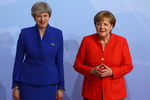 Премьер-министр Великобритании Тереза Мэй и канцлер Германии Ангела Меркель 