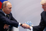 Владимир Путин и Дональд Трамп во время встречи на саммите G20 в Гамбурге