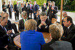 Меркель, Путин, Порошенко и Олланд во время встречи в Париже