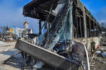 A broken bus on Kuprina Street in Mariupol, March 2022