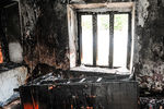 Сожженные и разбитые местными жителями дома цыган села Лощиновка в Одесской области