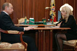 15 ноября 2007 года. Президент России Владимир Путин и министр здравоохранения и социального развития Российской Федерации Татьяна Голикова во время встречи в Кремле