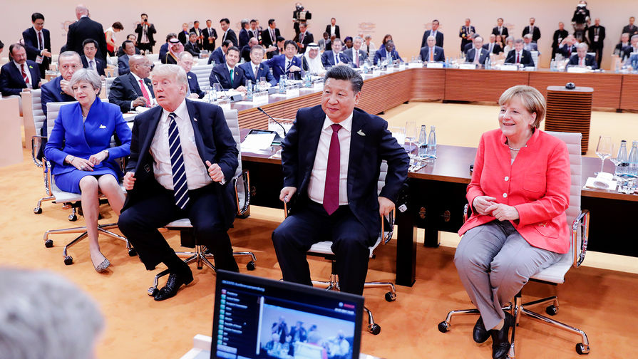 Президент Турции Реджеп Тайип Эрдоган, британский премьер-министр Тереза Мэй, президент США Дональд Трамп, председатель КНР Си Цзиньпин и канцлер ФРГ Ангела Меркель во время саммита G20 в Гамбурге, июль 2017 года