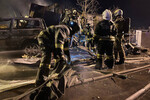 Тушение пожара на месте крушения самолета Су-30 в Иркутске, 23 октября 2022 года