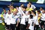 Игроки «Коринианса» празднуют победу в финале клубного чемпионата мира