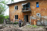 Дом, разрушенный в результате обстрела Донецка