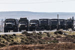 Колонна отряда Международного противоминного центра Вооруженных сил РФ, направляющаяся с российской авиабазы Хмеймим в Пальмиру