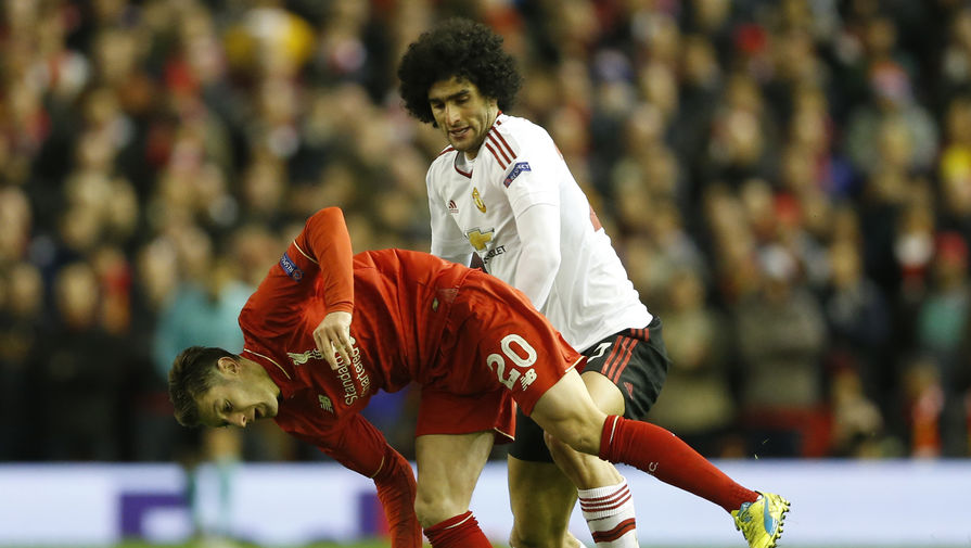 Football Soccer &mdash; Liverpool v Manchester United &mdash; UEFA Europa League Round of 16&nbsp;First Leg &mdash; Anfield, Liverpool, England &mdash; 10/3/16
Liverpool's Adam Lallana in action with Manchester United's Marouane Fellaini
Action Images via Reuters / Carl Recine
Livepic
EDITORIAL USE ONLY.
