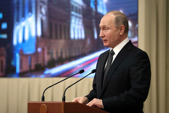 Президент России Владимир Путин во время собрания в честь 95-летия со дня образования Верховного суда России, 23 января 2018 года